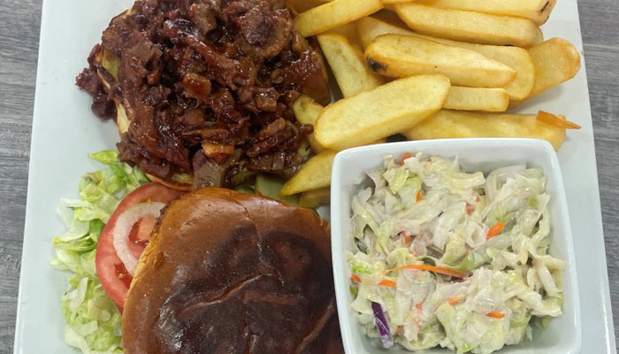 Monday special at Omars at TTT Brisket sandwich with coleslaw and fries