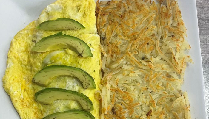 Omars TTT serving sunday special of a veggie omelette